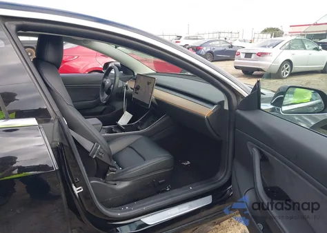 2019 Tesla Model 3 из США, поврежденный, VIN 5YJ3E1EB7KF385298